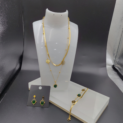 Nieuwste gouden kleur roestvrij staal oorbel, halsketting, armband met groene steen voor dame