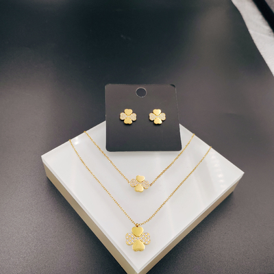 Nieuwe aankomst Trendy High Polish nieuwste gouden kleur roestvrij staal oorbel, halsketting, armbandset met Zirco voor dame