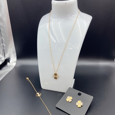 Nieuwe aankomst Trendy High Polish nieuwste gouden kleur roestvrij staal oorbel, halsketting, armbandset met Zirco voor dame