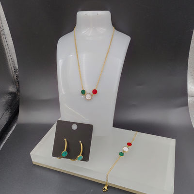 Nieuwste gouden kleur roestvrij staal oorbel, ketting, armband met groene schelp voor dame
